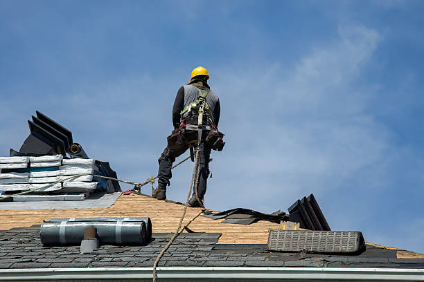 Professional Roof Replacement technician working in Benton, IA